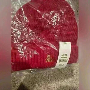 Brand new baby beanie in packaging.